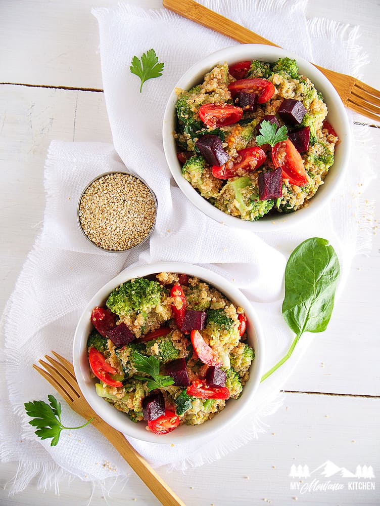 quinoa salad with broccoli in bowls