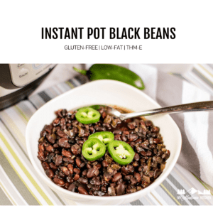 cooked instant pot black beans in white bowl