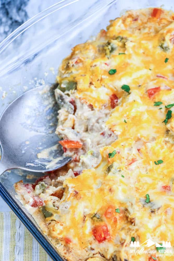 close up of king ranch chicken casserole with a spoon
