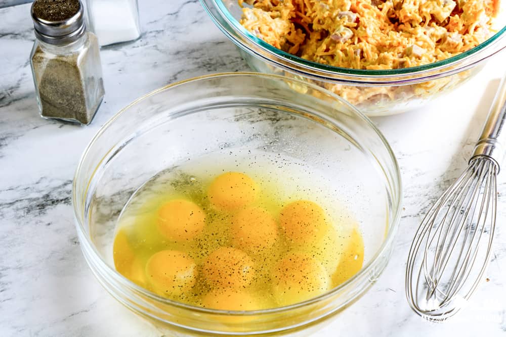 unwhisked eggs in glass bowl