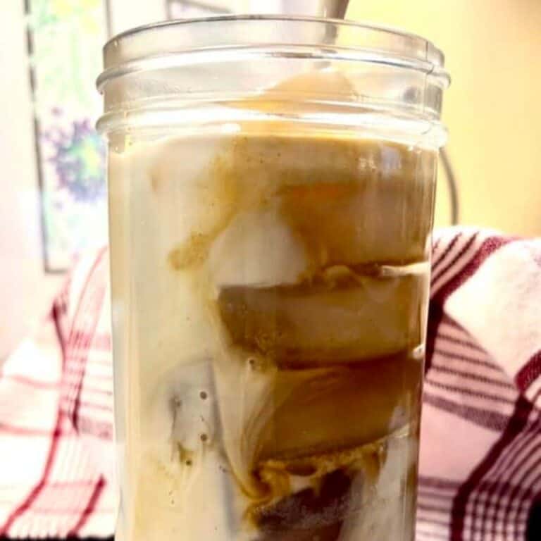 glass with espresso and oatmilk