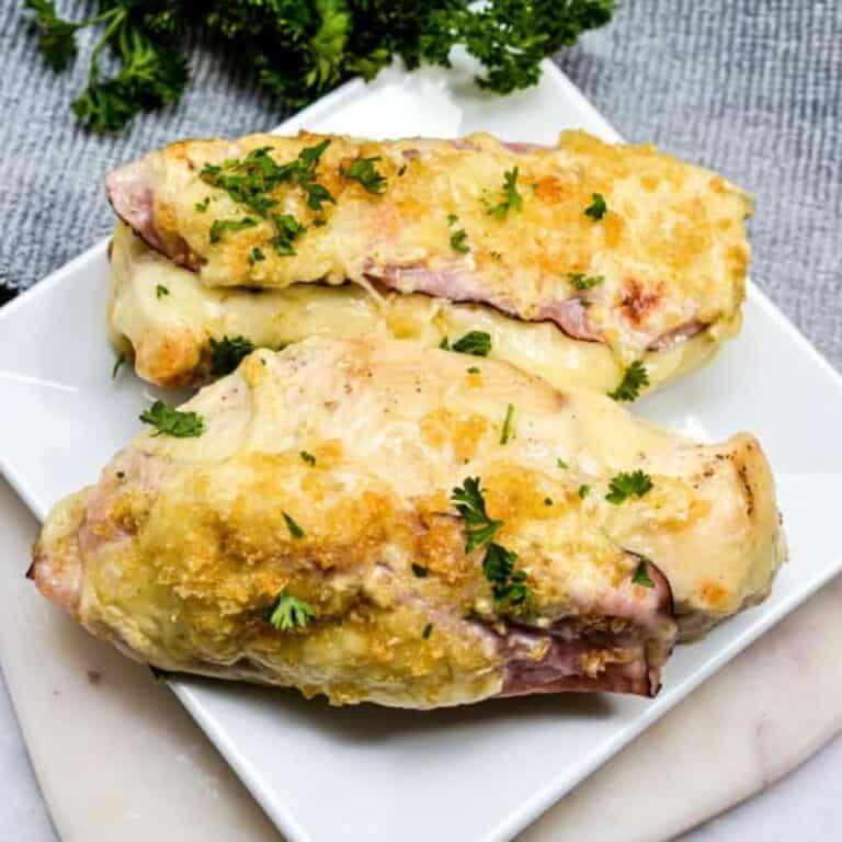 chicken cordon bleu on white plate