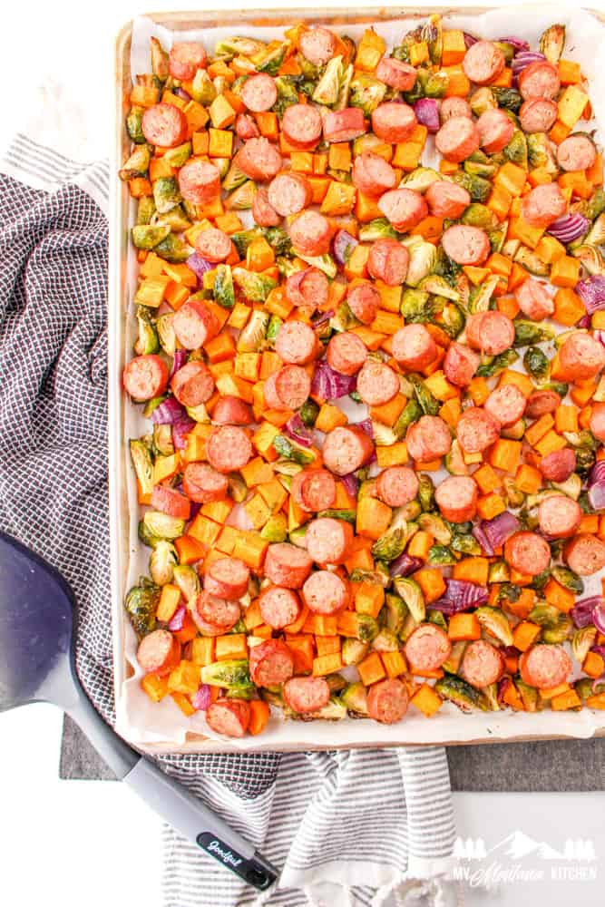 sheet pan full of roasted vegetables and sausage