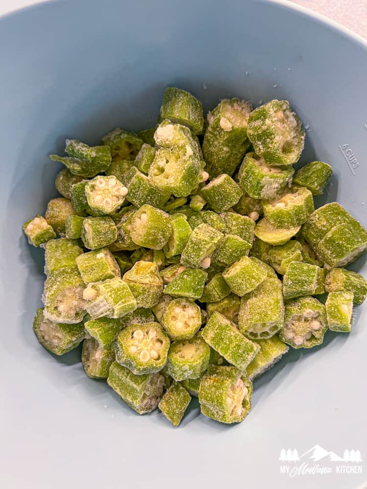 frozen cut okra in blue bowl