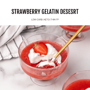 strawberry gelatin with whipped cream and fresh strawberry