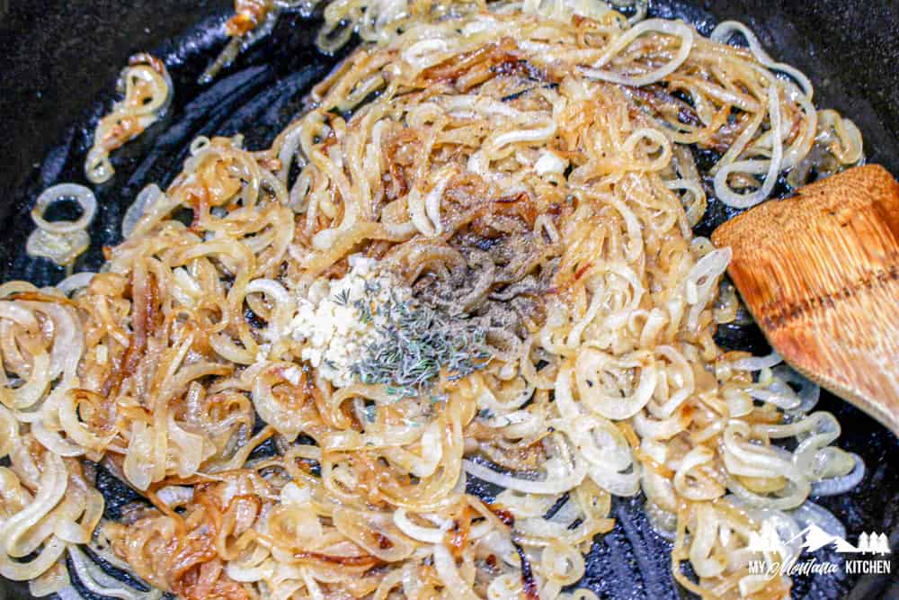 caramelized onions in skillet with spices