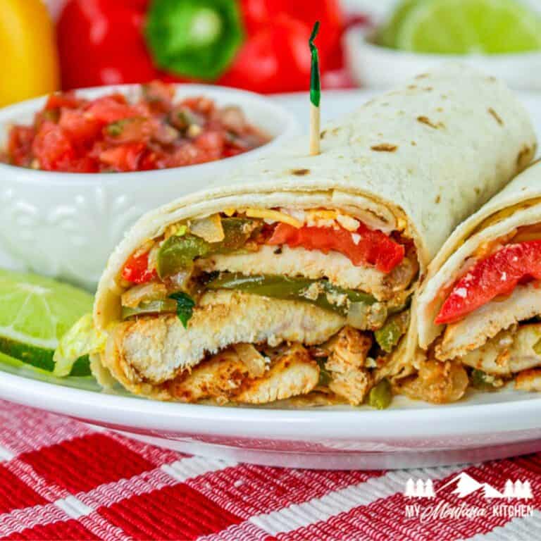 chicken fajita wraps on white plate