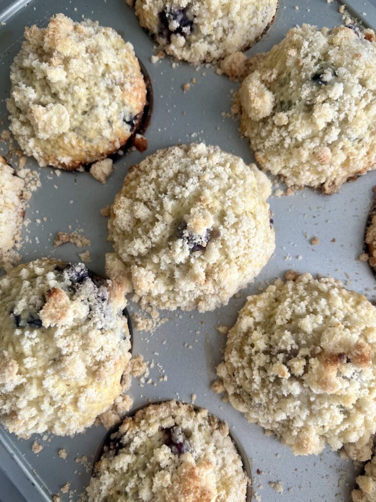 baked sourdough blueberry muffins with crunchy crumb topping