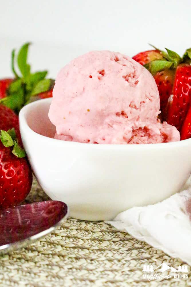 Close-up of strawberry cottage cheese ice cream in a white bowl