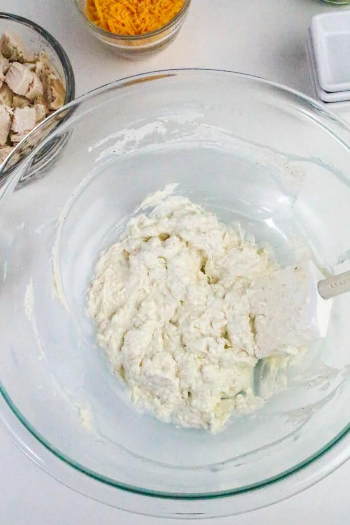Creamy dressing mixture in a bowl for jalapeño popper chicken salad before the mix-ins are added.