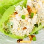 jalapeno popper chicken salad in lettuce on white plate