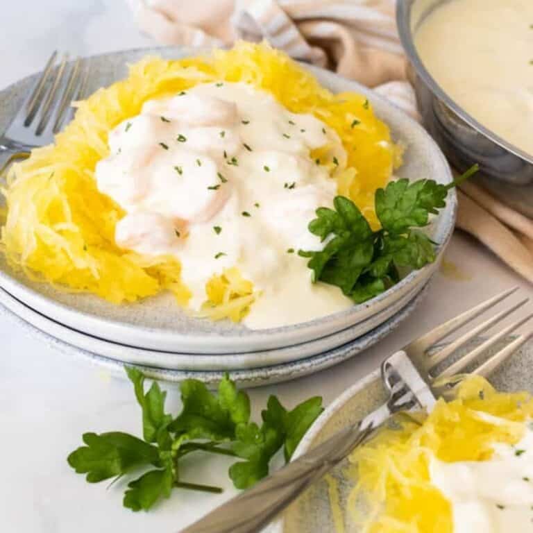 keto shrimp alfredo with spaghetti squash on gray plate