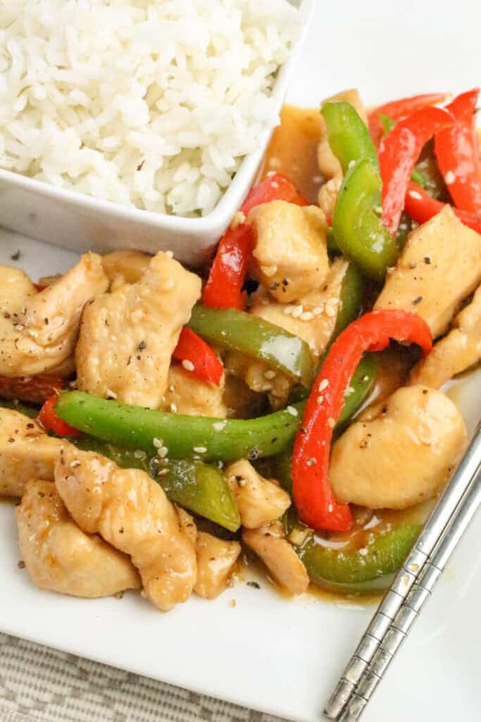 Crispy honey pepper chicken coated in a sweet and savory honey glaze with black pepper.