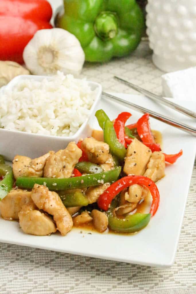 Bowl of honey pepper chicken tossed in sweet honey glaze and black pepper.